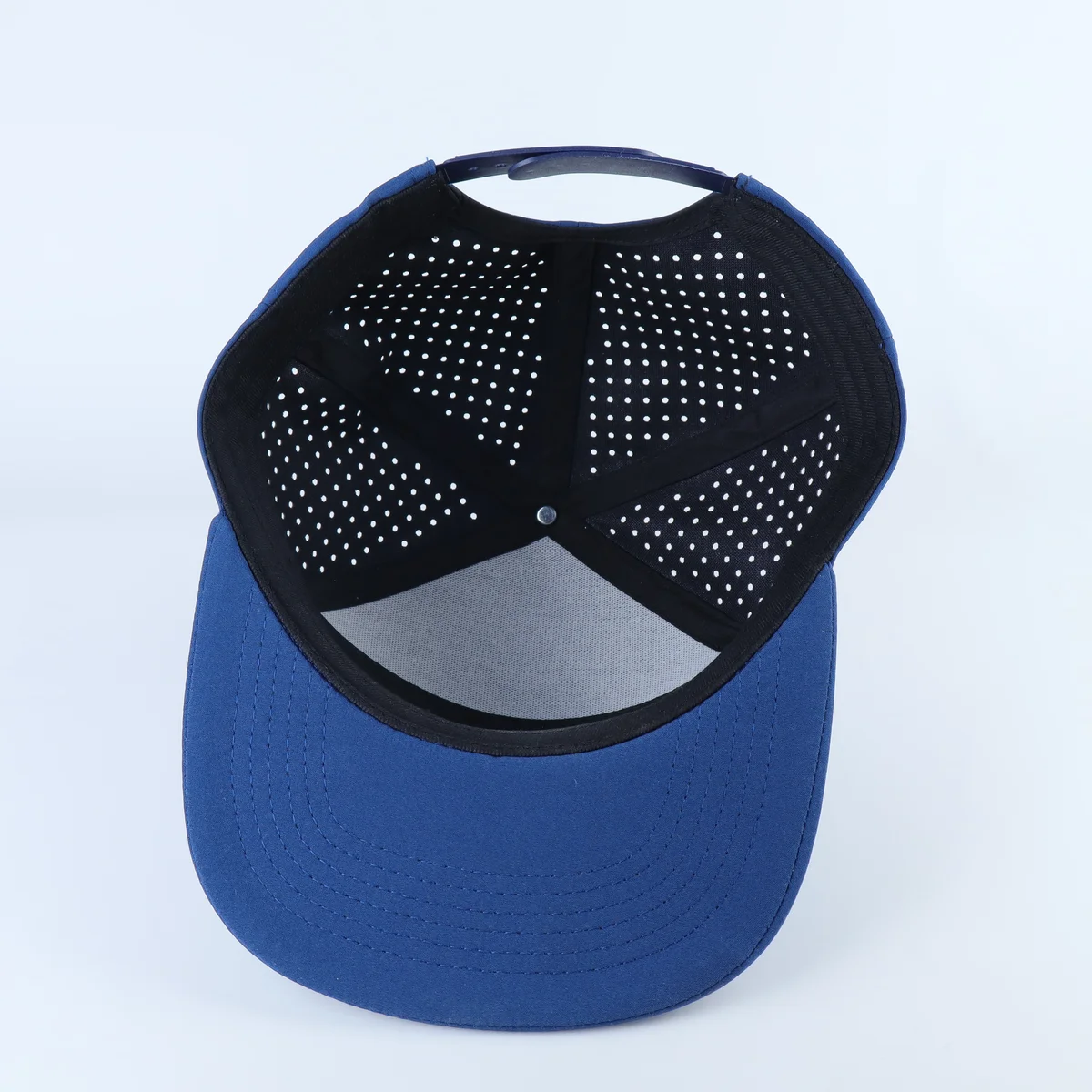 Photographic view 7 of a perforated performance cap reference